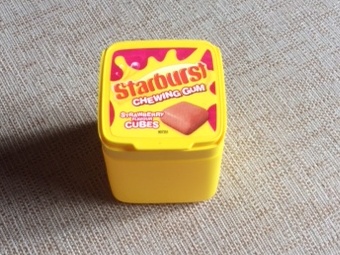 A yellow container labeled 