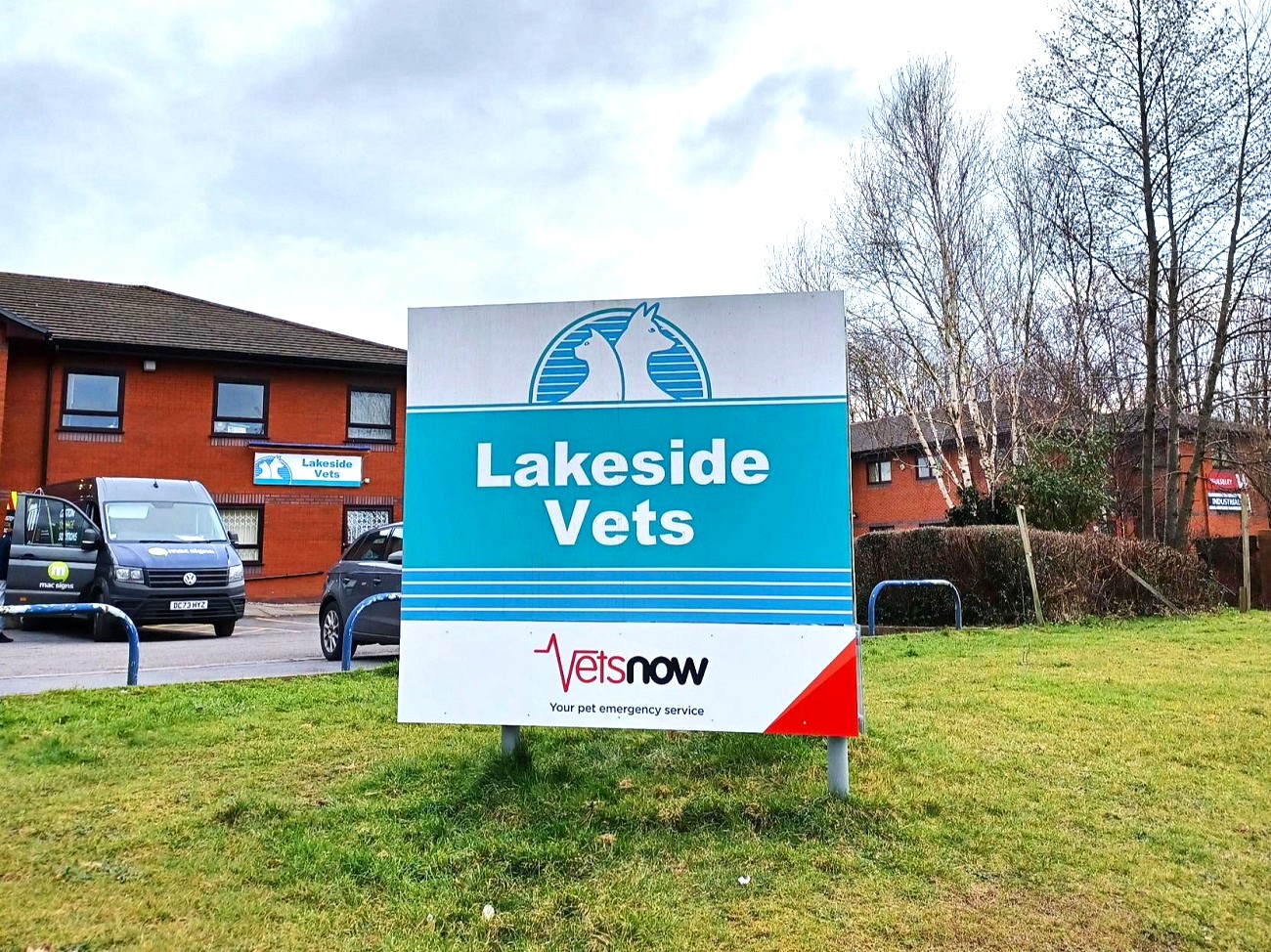 Lakeside Vets Swansea large roadside sign with Vets Now branding in front of clinic building. Lakeside Vets Swansea large roadside sign with Vets Now branding in front of clinic building.