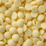 Fragments of white chocolate in button shape