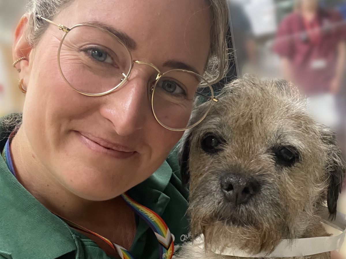 Elle_Haskey Image of vet Elle Haskey posing with a borders terrier dog.